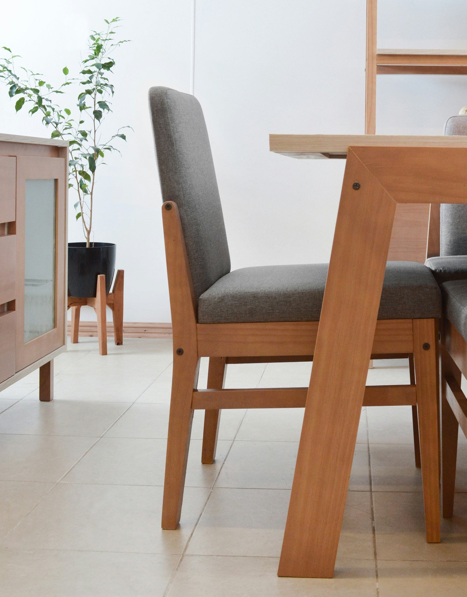 Stylish dining chairs gathered around a beautifully set table
