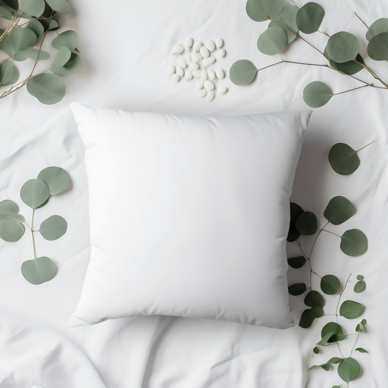 Soft bed pillows arranged on a cozy bed