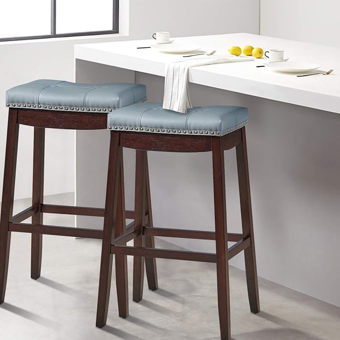 COSTWAY Bar Stools Set of 2, 29-Inch Height Backless Counter Stool with Footrest, Soft Seat Cushion, Wood Legs and Non-Slip Foot Pad, Saddle Stools for Home Kitchen Living Room, Stone Gray+Dark Brown