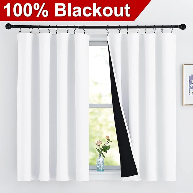 NICETOWN 100% Blackout Curtains 54 inches Long, Double-Deck Completely Blackout Window Treatment Thermal Insulated Lined Rod Pocket Drapes for Infant (White, 1 Pair, 52 inches Width Each Panel)