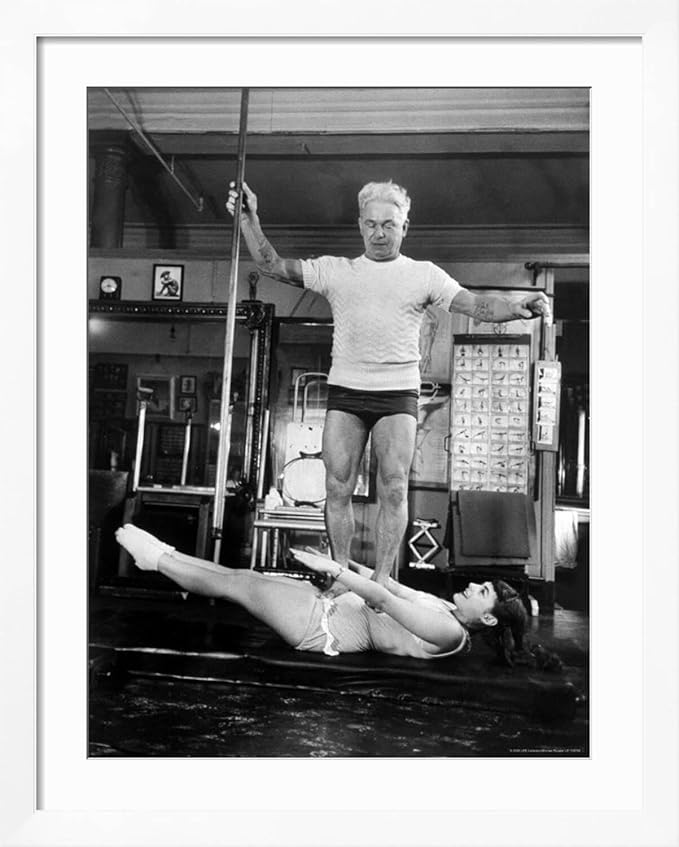 ART.COM Wall Premium Photographic Print Opera Singer Roberta Peters Balancing Her Trainer, Joseph Pilates, on Her Operatic Breadbasket on White Frame by Michael Rougier, 32" x 40"