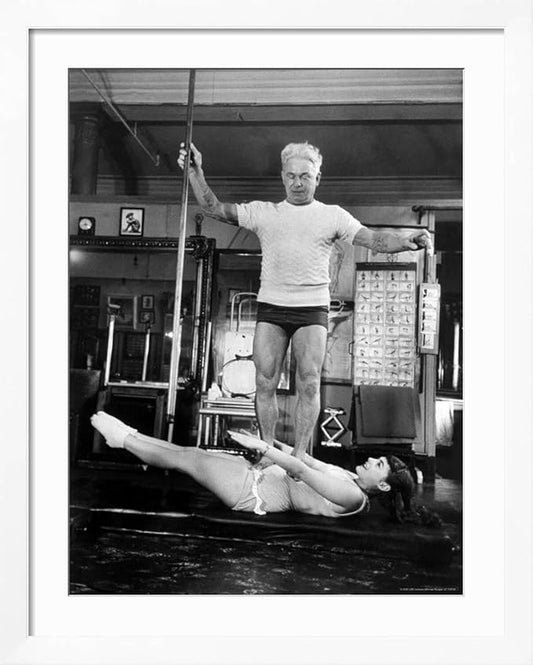 ART.COM Wall Premium Photographic Print Opera Singer Roberta Peters Balancing Her Trainer, Joseph Pilates, on Her Operatic Breadbasket on White Frame by Michael Rougier, 32" x 40"