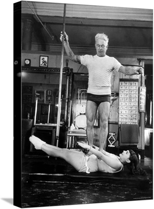 ART.COM Stretched Canvas Print Opera Singer Roberta Peters Balancing Her Trainer, Joseph Pilates, on Her Operatic Breadbasket by Michael Rougier, 12" x 16"