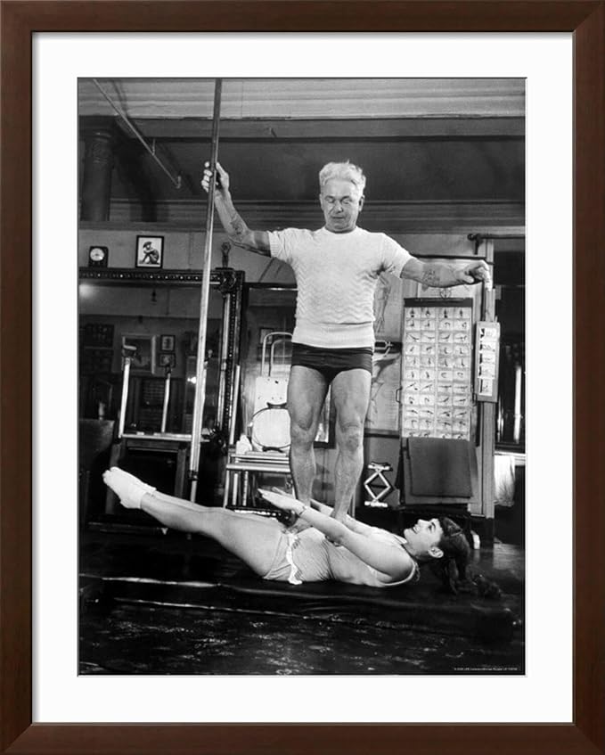 ART.COM Wall Premium Photographic Print Opera Singer Roberta Peters Balancing Her Trainer, Joseph Pilates, on Her Operatic Breadbasket on Brown Frame by Michael Rougier, 32" x 40"