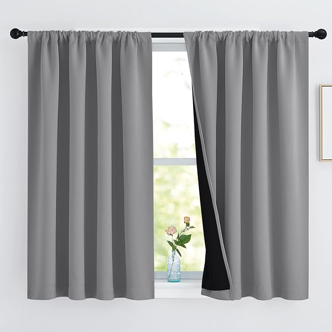 NICETOWN 100% Blackout Curtains with Black Liners, Thermal Insulated Rod Pocket Full Blackout 2-Layer Lined Drapes, Noise Reducing Window Draperies for Nursery (Silver Gray, 2 Panels, 52 W by 54 L)
