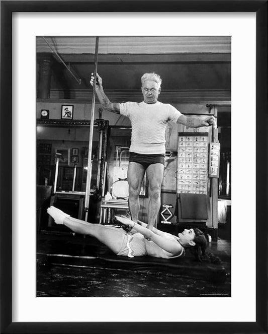 ART.COM Wall Premium Photographic Print Opera Singer Roberta Peters Balancing Her Trainer, Joseph Pilates, on Her Operatic Breadbasket on Black Frame by Michael Rougier, 17" x 21"