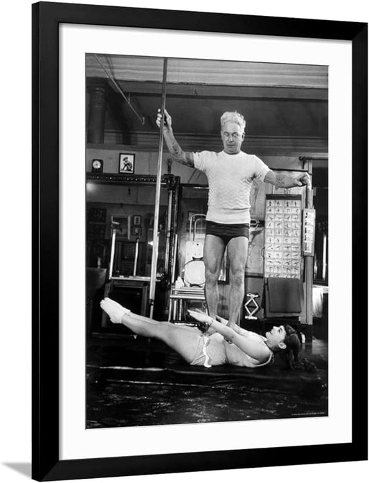 ART.COM Wall Premium Photographic Print Opera Singer Roberta Peters Balancing Her Trainer, Joseph Pilates, on Her Operatic Breadbasket on Black Frame by Michael Rougier, 32" x 40"