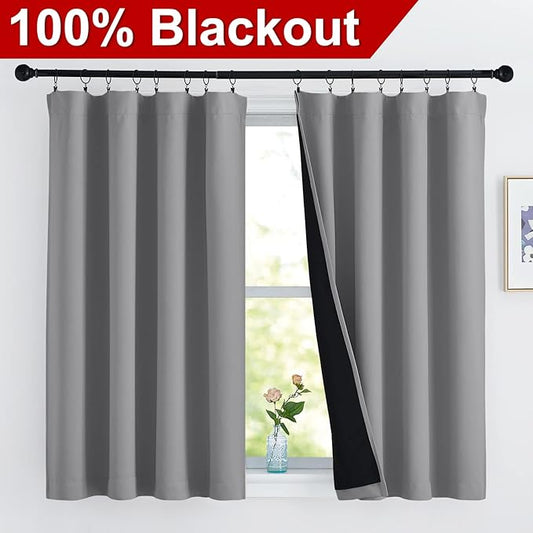 NICETOWN 100% Blackout Curtains with Black Liners, Thermal Insulated Rod Pocket Full Blackout 2-Layer Lined Drapes, Noise Reducing Window Draperies for Nursery (Silver Gray, 2 Panels, 52 W by 54 L)