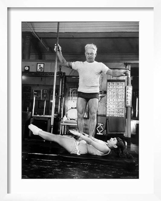 ART.COM Wall Premium Photographic Print Opera Singer Roberta Peters Balancing Her Trainer, Joseph Pilates, on Her Operatic Breadbasket on White Frame by Michael Rougier, 17" x 21"