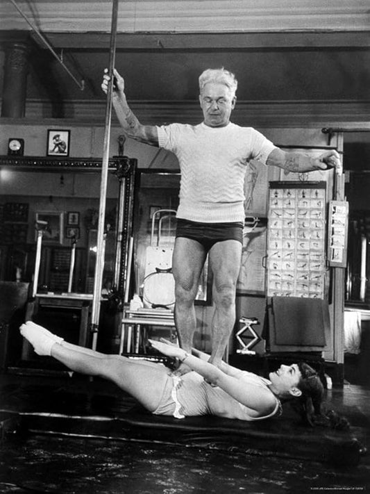 ART.COM Wall Premium Photographic Print Opera Singer Roberta Peters Balancing Her Trainer, Joseph Pilates, on Her Operatic Breadbasket by Michael Rougier, 24" x 32"