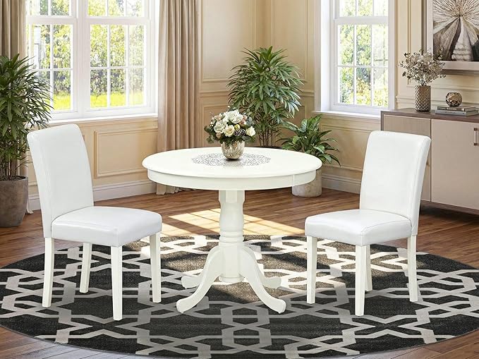East West Furniture ANAB3-LWH-64 3 Piece Modern Dining Table Set Contains a Round Kitchen Table with Pedestal and 2 White Faux Leather Upholstered Chairs, 36x36 Inch, Linen White