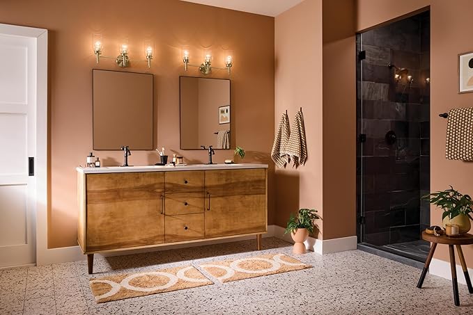 Kichler Madden 3-Light Vanity with Clear Glass in Champagne Bronze, Sloped Ceiling Compatible, for Single Vanity in Bathroom (10.5" x 24"), 55185CPZ